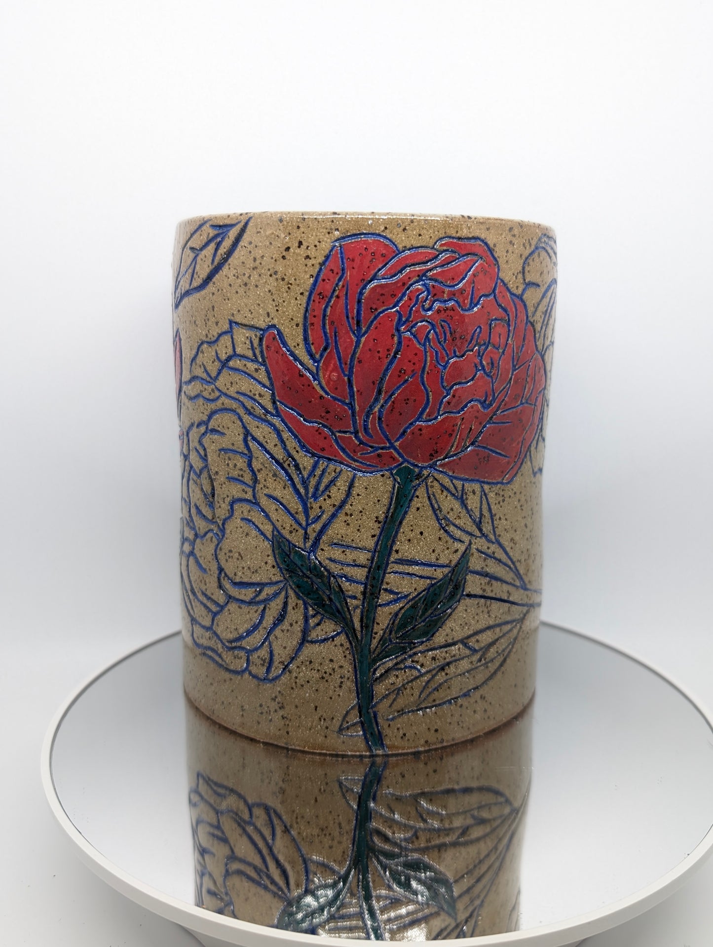 Hand carved floral vase or utensil holder