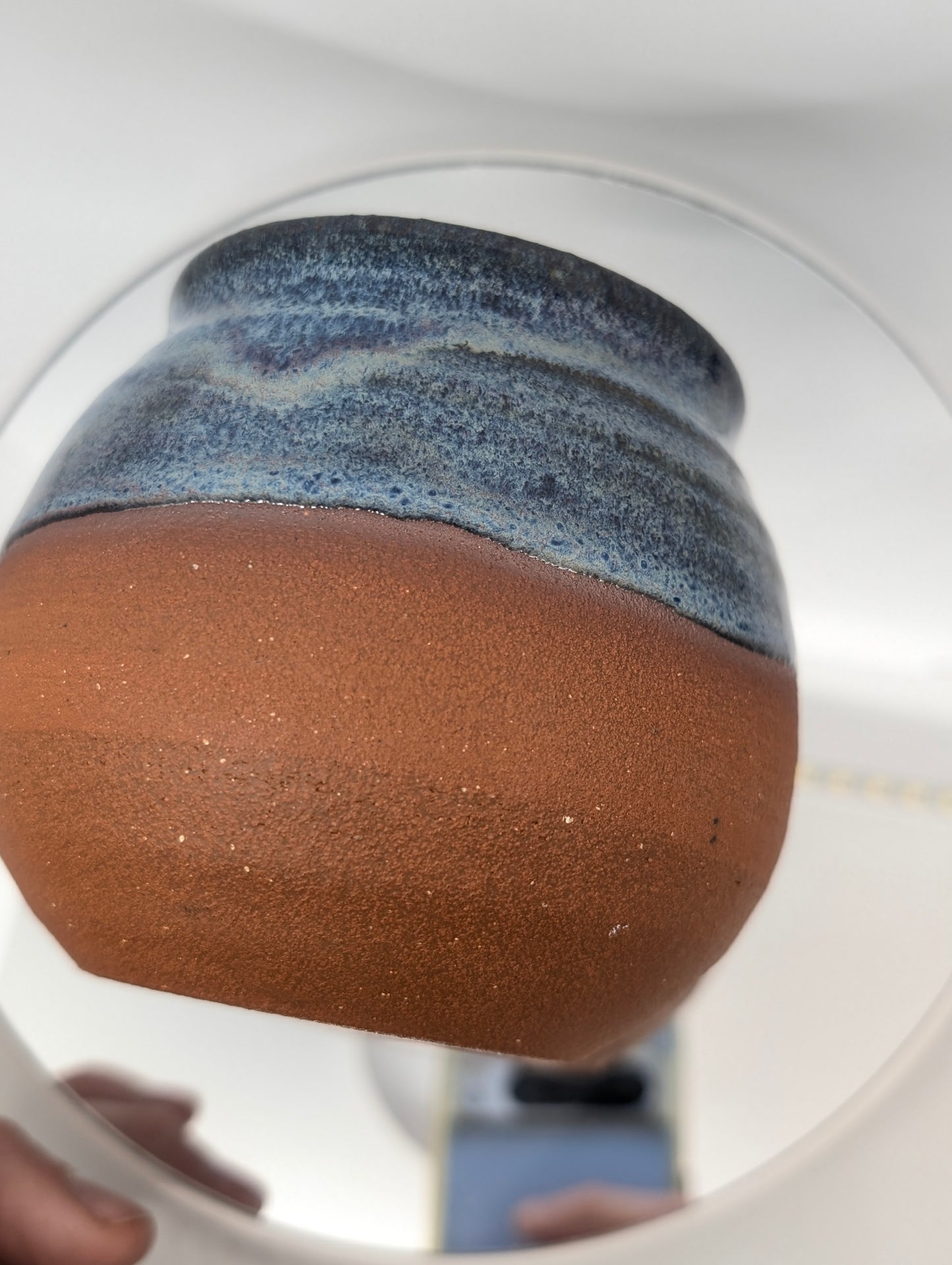 Red clay and blue waves mug