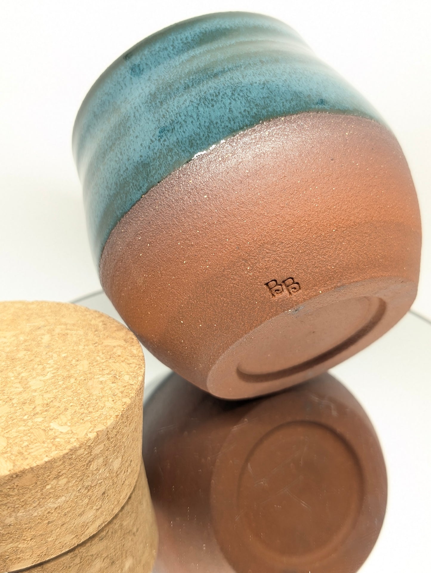 Turquoise jar with cork lid