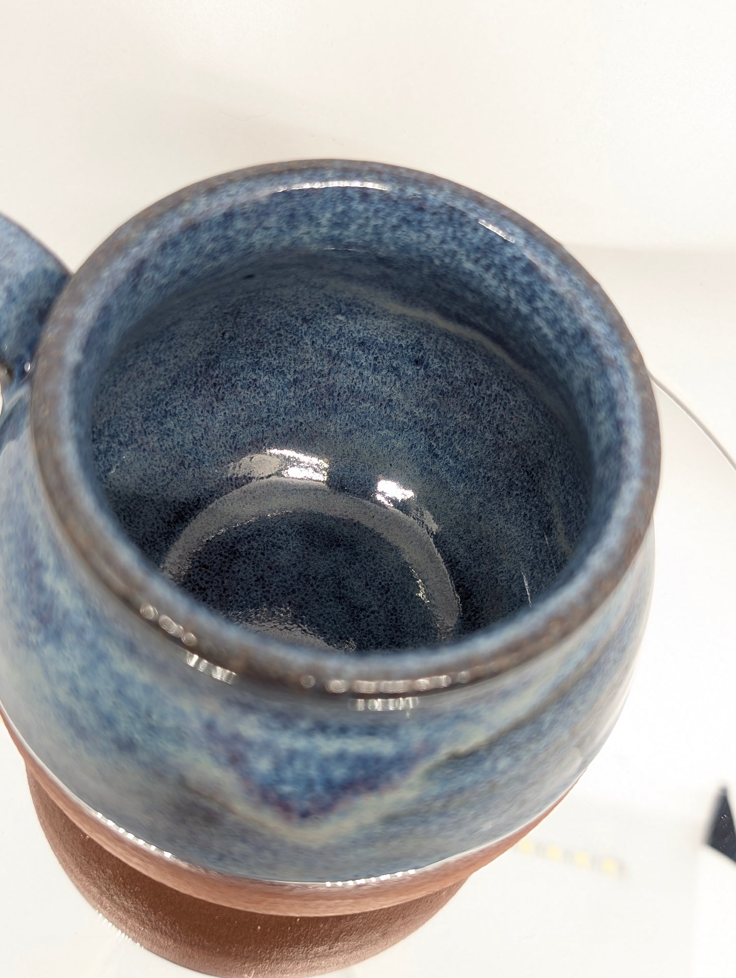 Red clay and blue waves mug