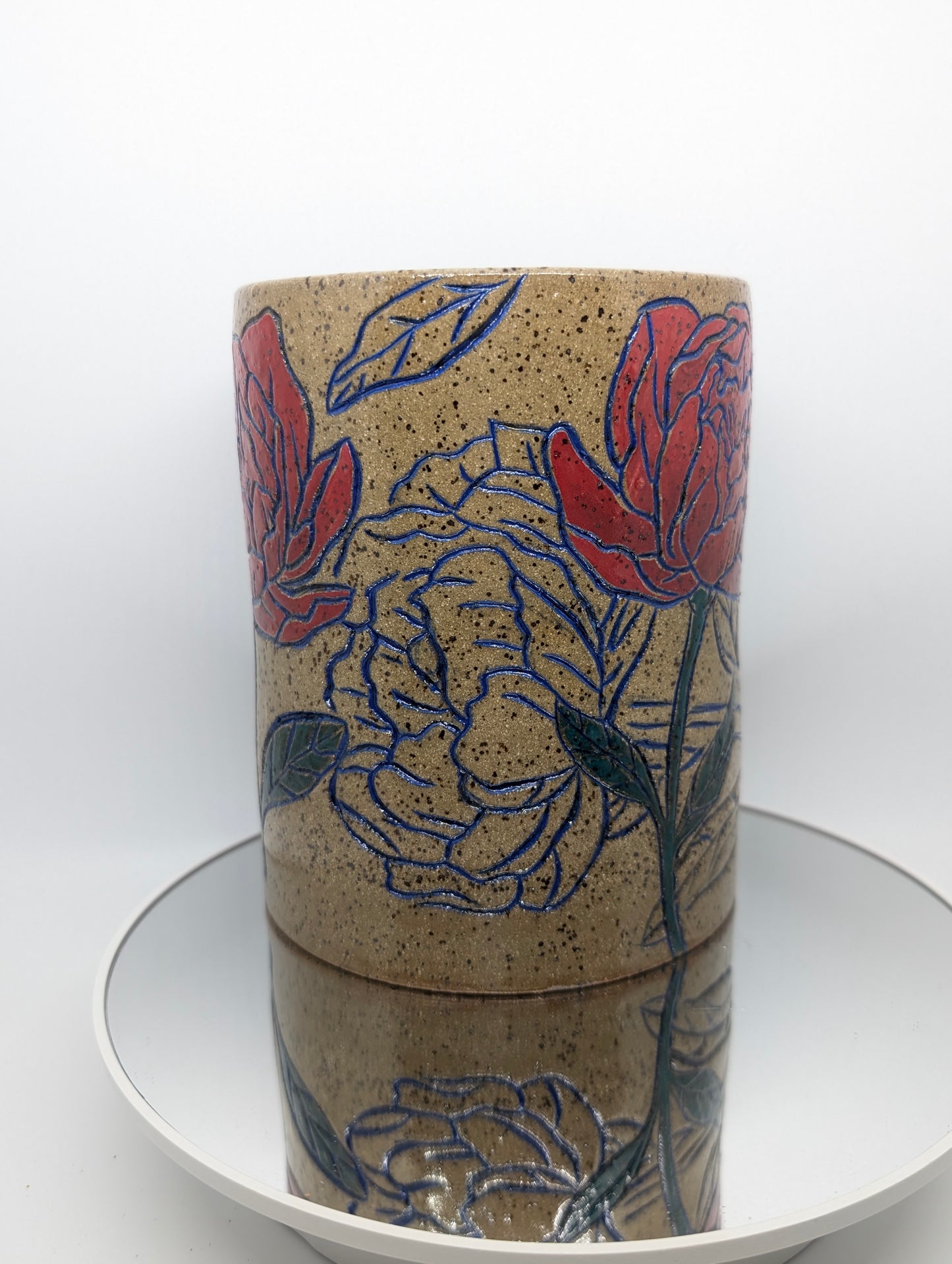 Hand carved floral vase or utensil holder