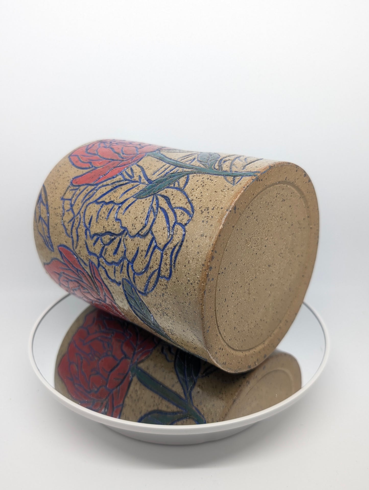 Hand carved floral vase or utensil holder