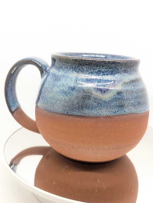 Red clay and blue waves mug