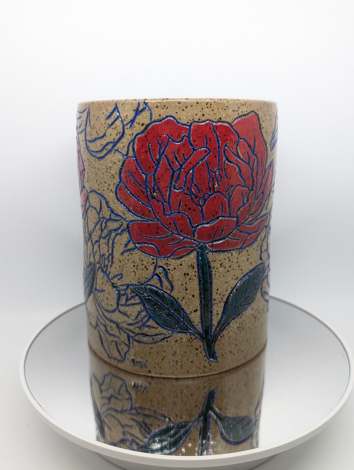 Hand carved floral vase or utensil holder