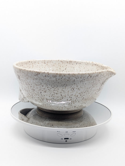 Speckled white mixing bowl with grip
