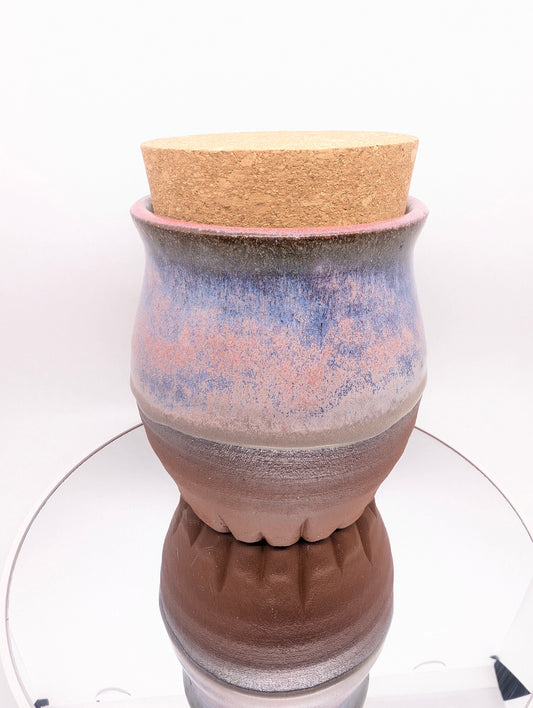 Pink and purple jar with cork lid