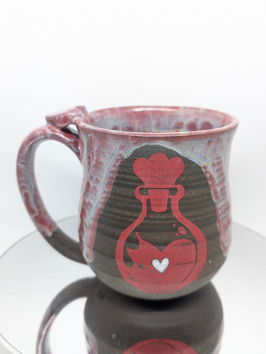 Love potion mug with heart thumb rest
